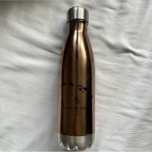 Brand new shiny bronze Four Seasons water bottle